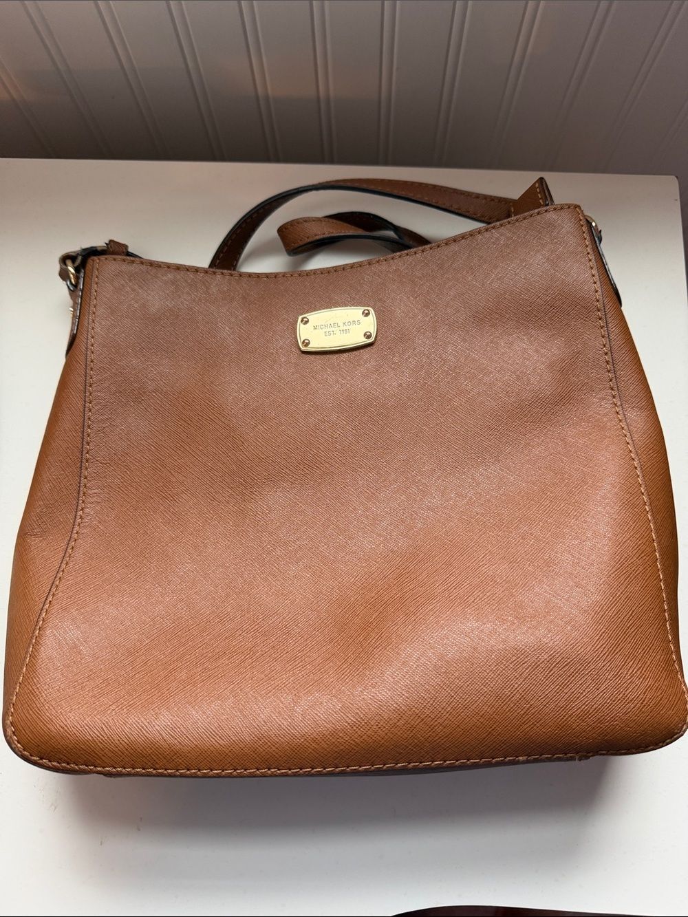Michael Kors Cognac Leather Crossbody Bag with Gold Plaque